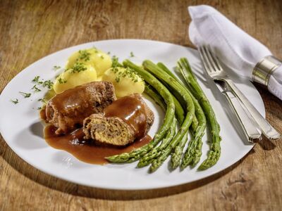 Beef roulade without pork bacon, filled with vegetables,